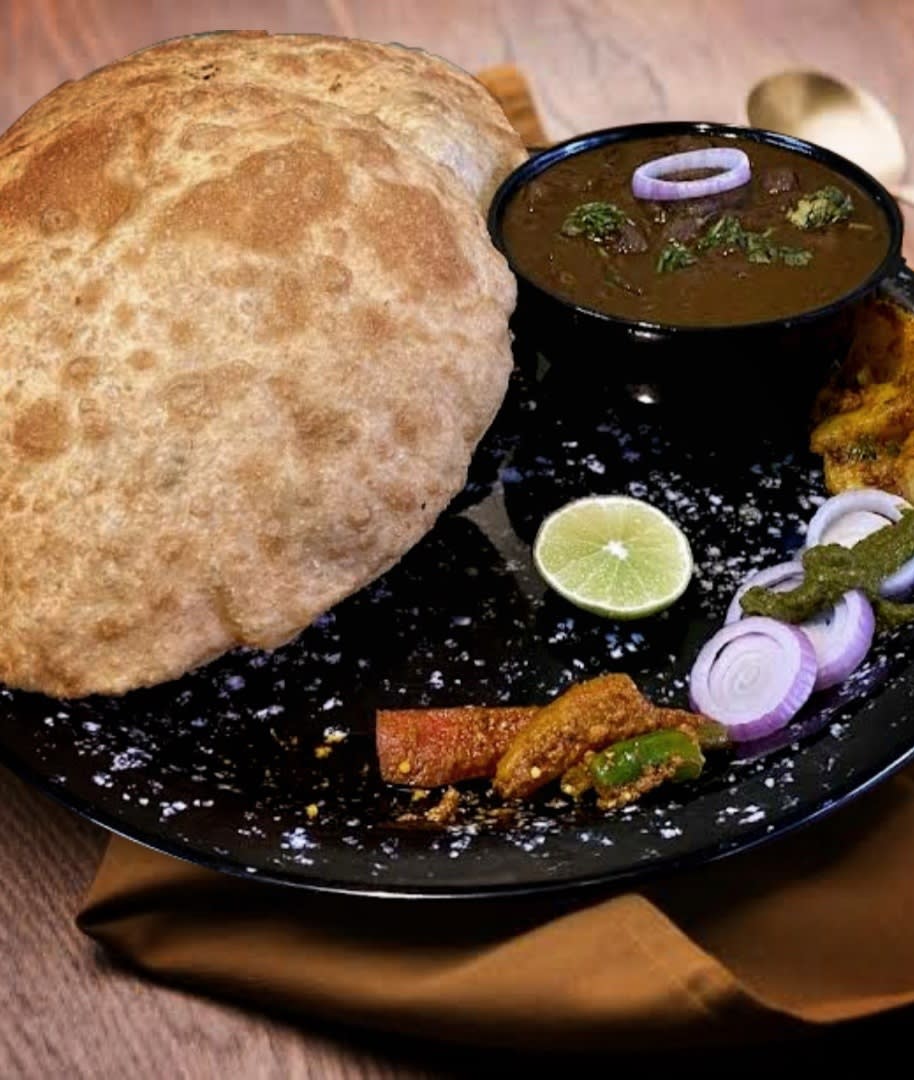 PAHARGANJ KE CHOLE BHATURE - Logo