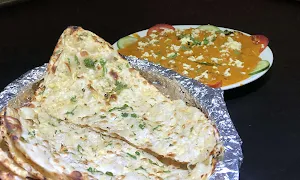 Pallkhi Restaurant - Logo