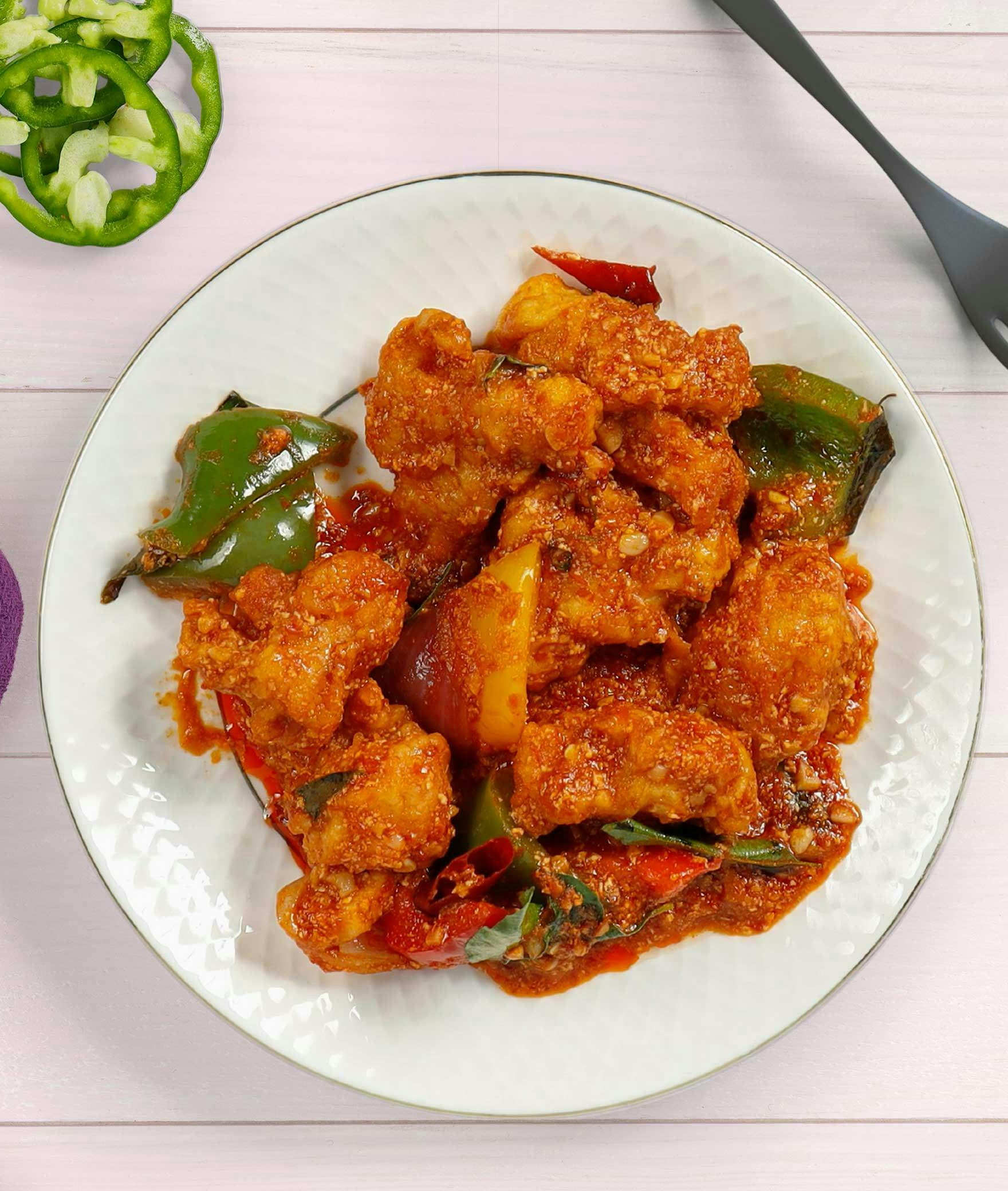 Paluskar Chicken 65 Centre - Logo