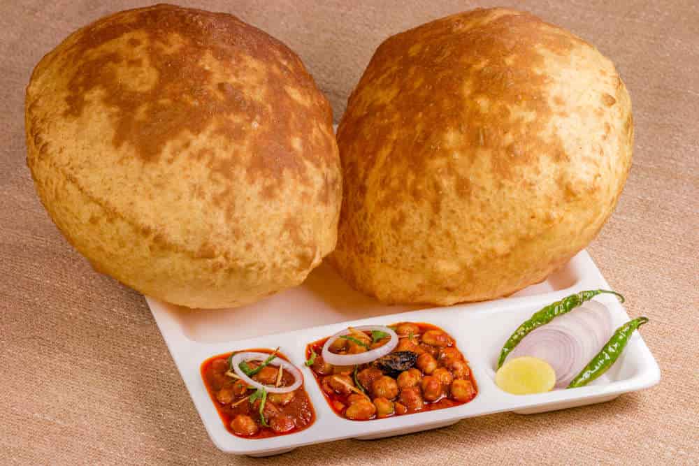 Pandit Ji Paharganj Ke Chole Bhature - Logo