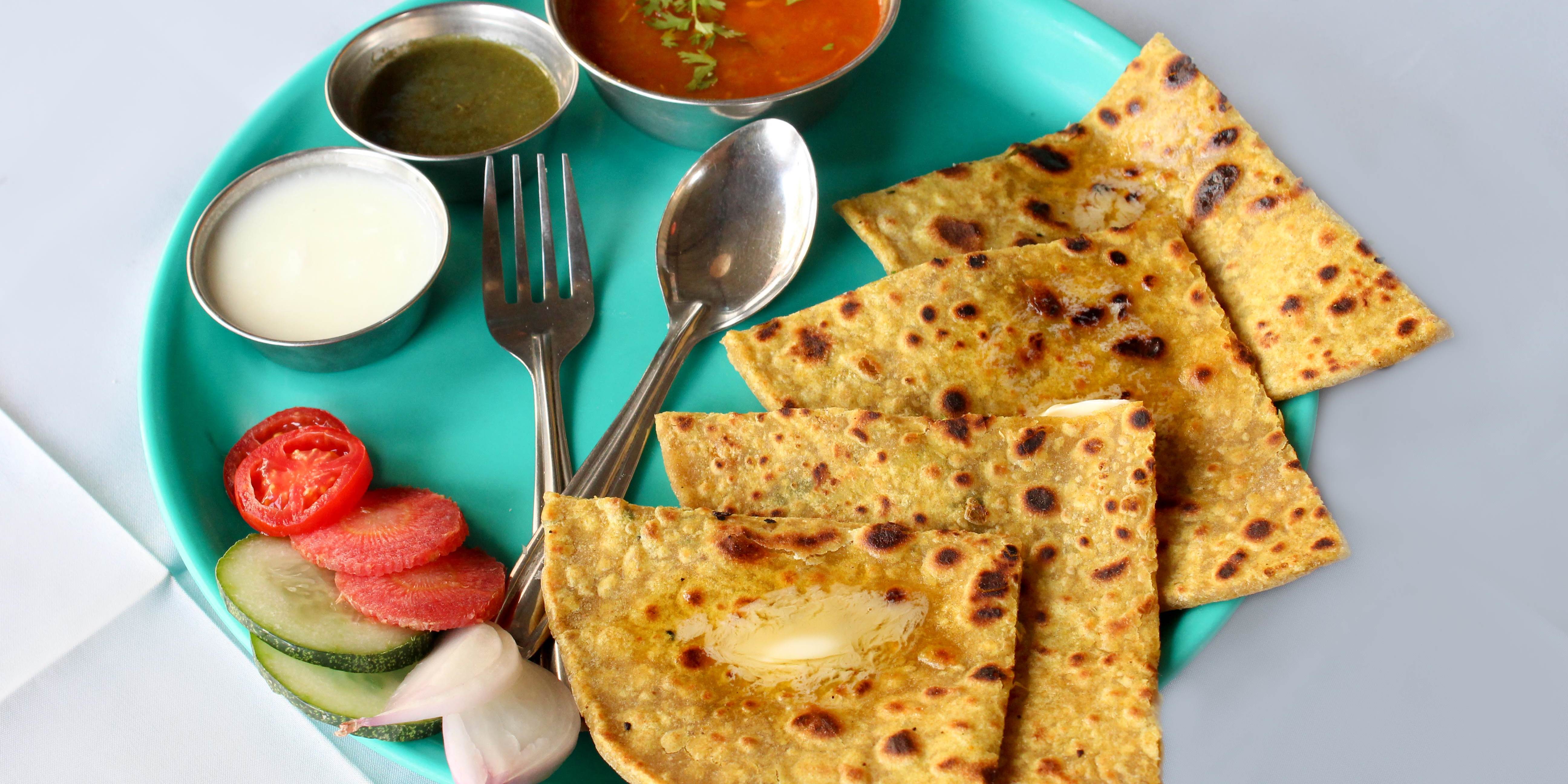 Paratha Makkhan Mar Ke - Logo