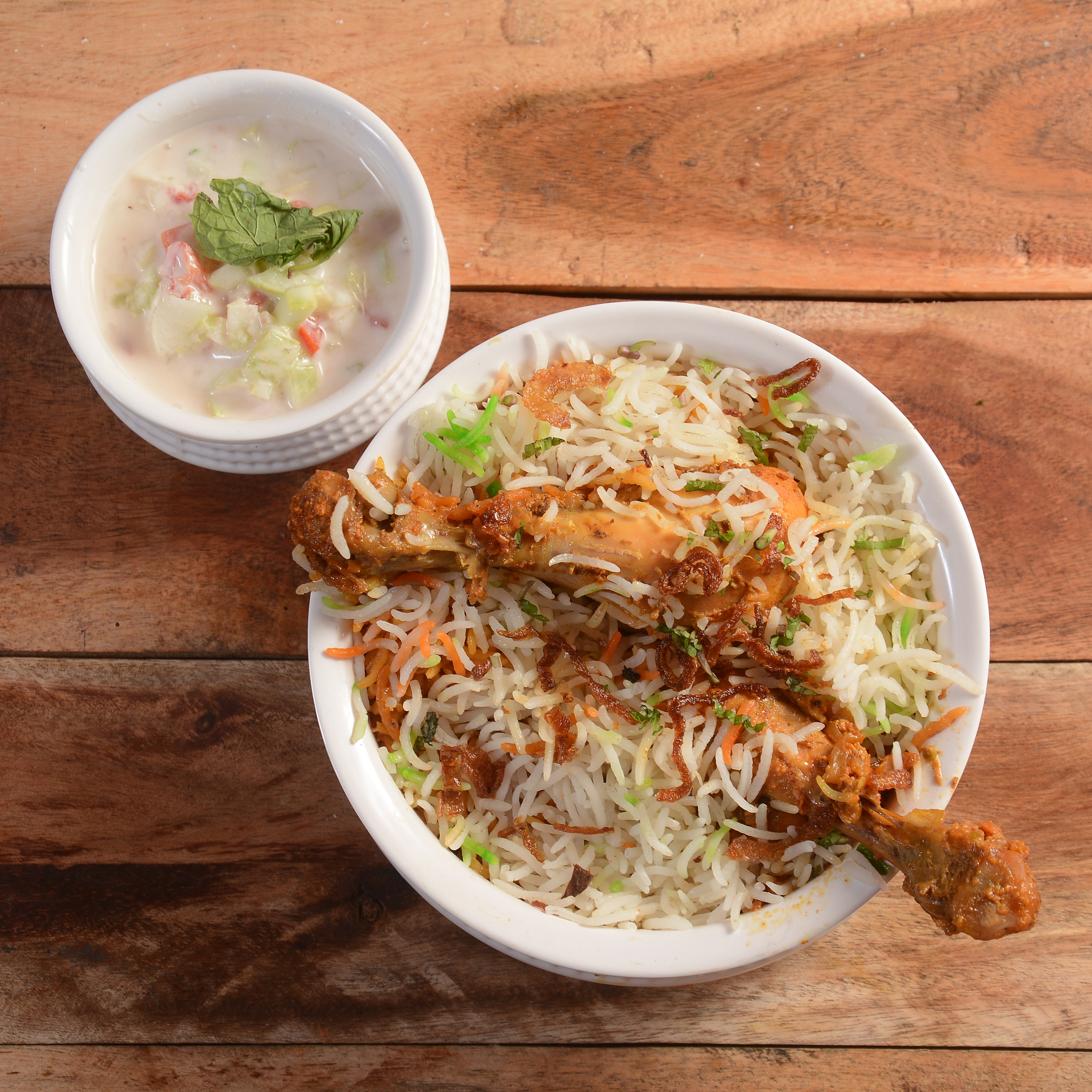 Pathan Laziz Biryani House - Logo