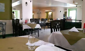 Peacock Restaurant - Logo
