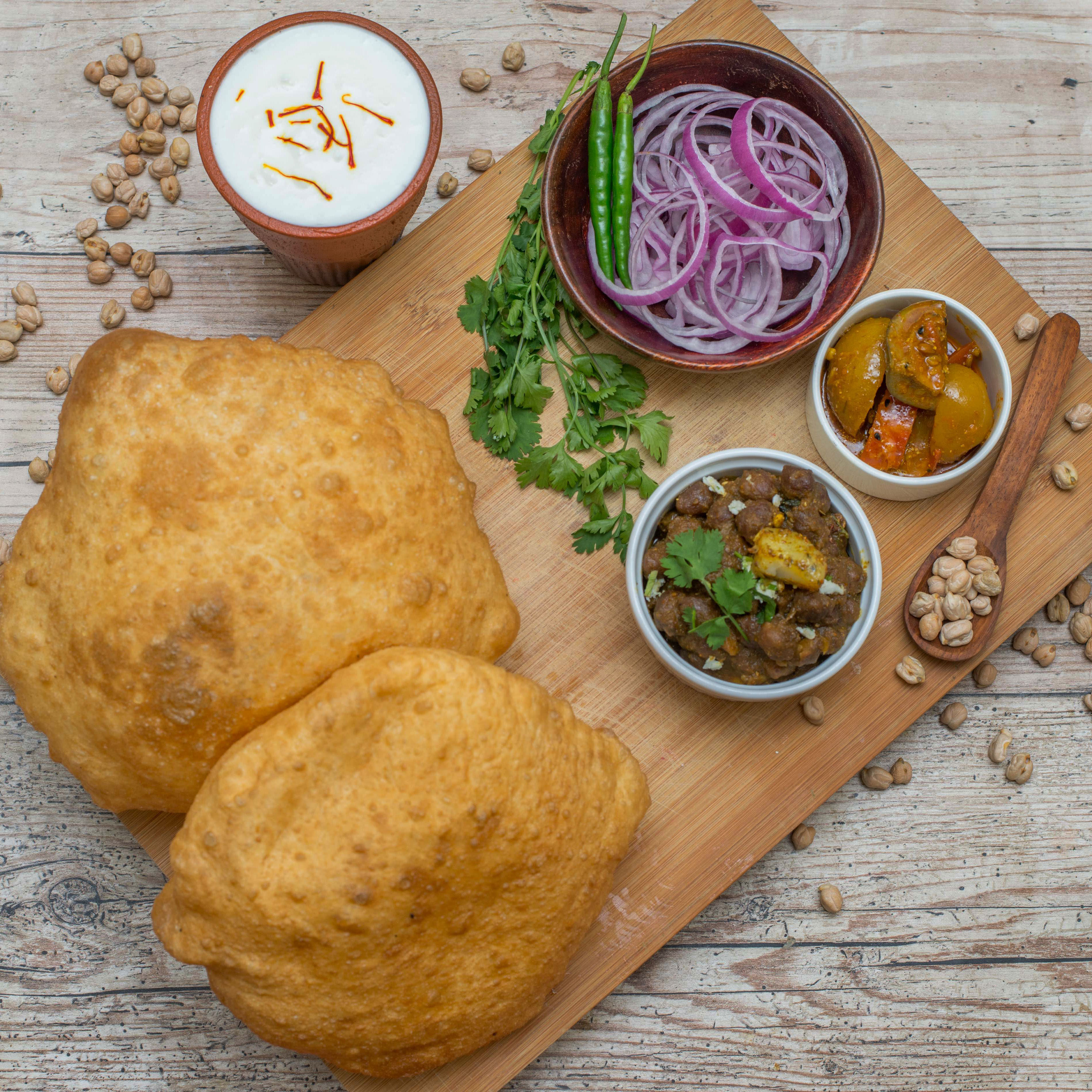 Pind Bhatura - Logo