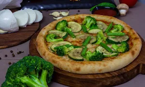Pizzza Next - Logo