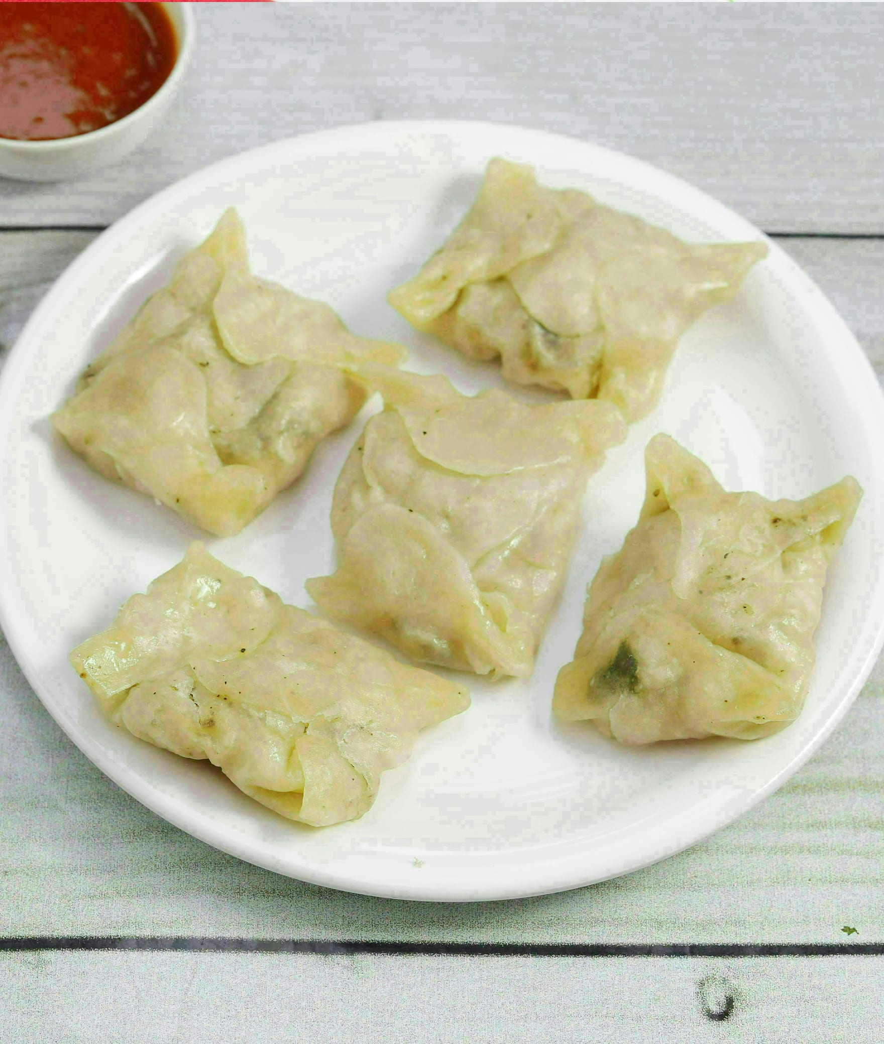 PKD MOMOS AND CHINESE CAFE - Logo