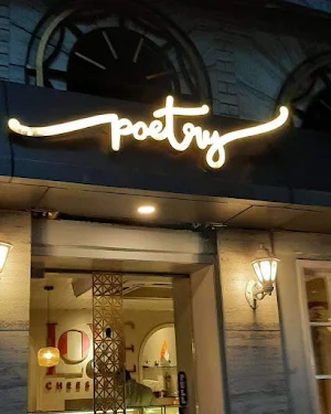 Poetry By Love And Cheesecake - Logo