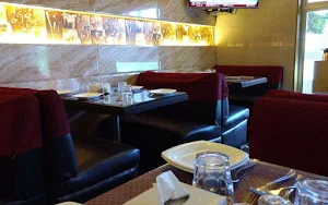Pooja Restaurant & Bar - Logo