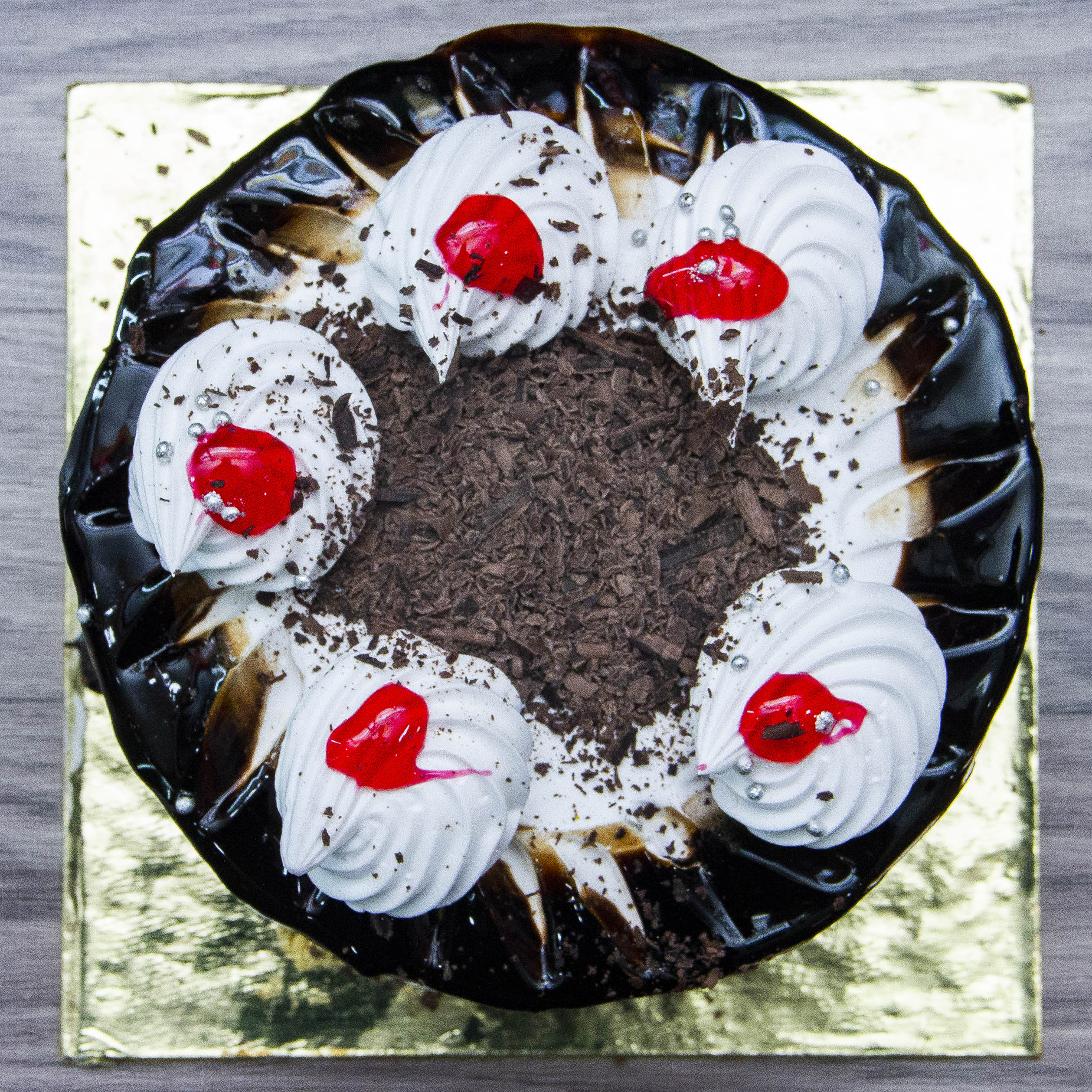 Pooja Sweets And Cake Bakery - Logo