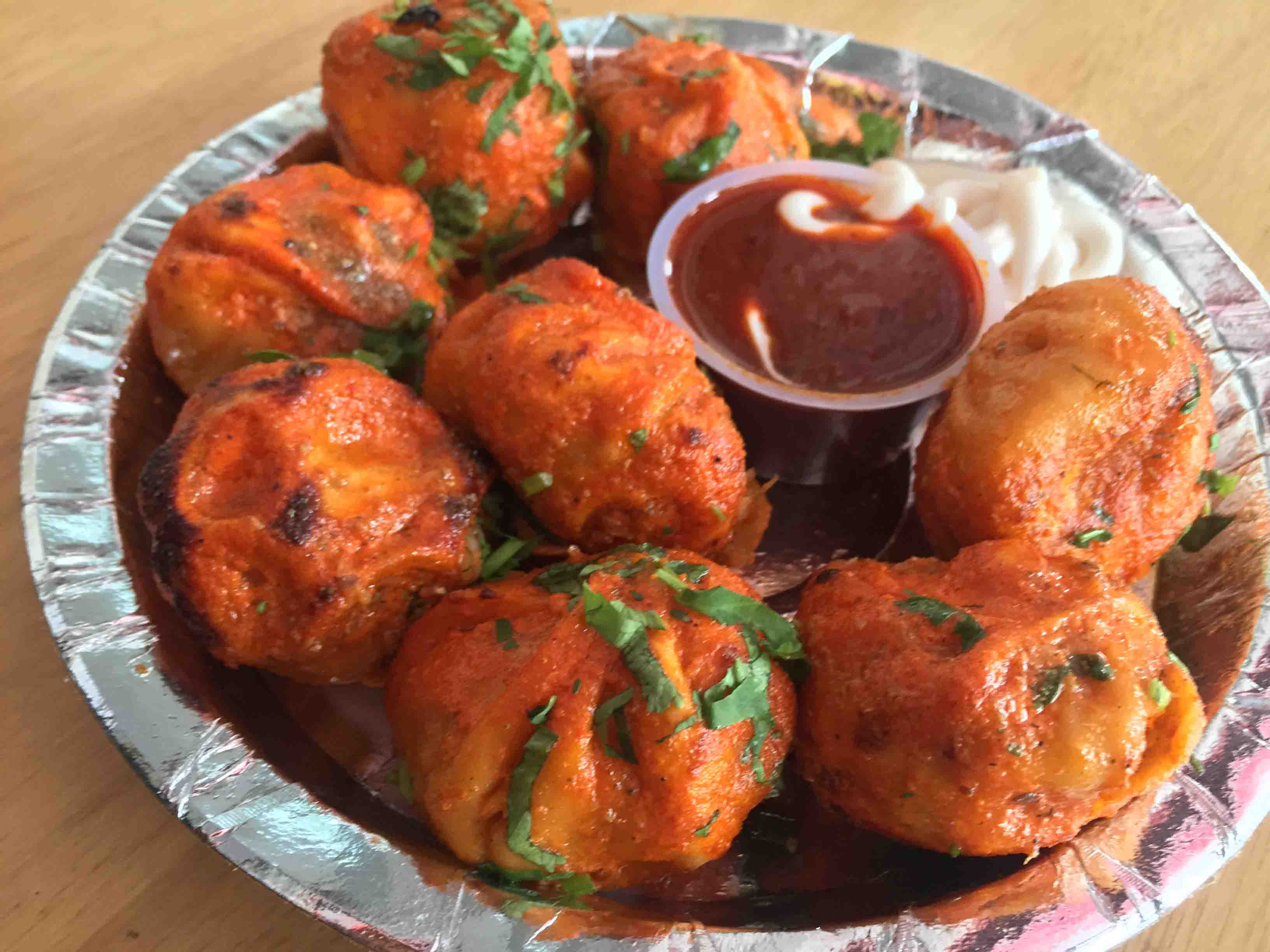 POPULAR MOMOS & MORE - Logo