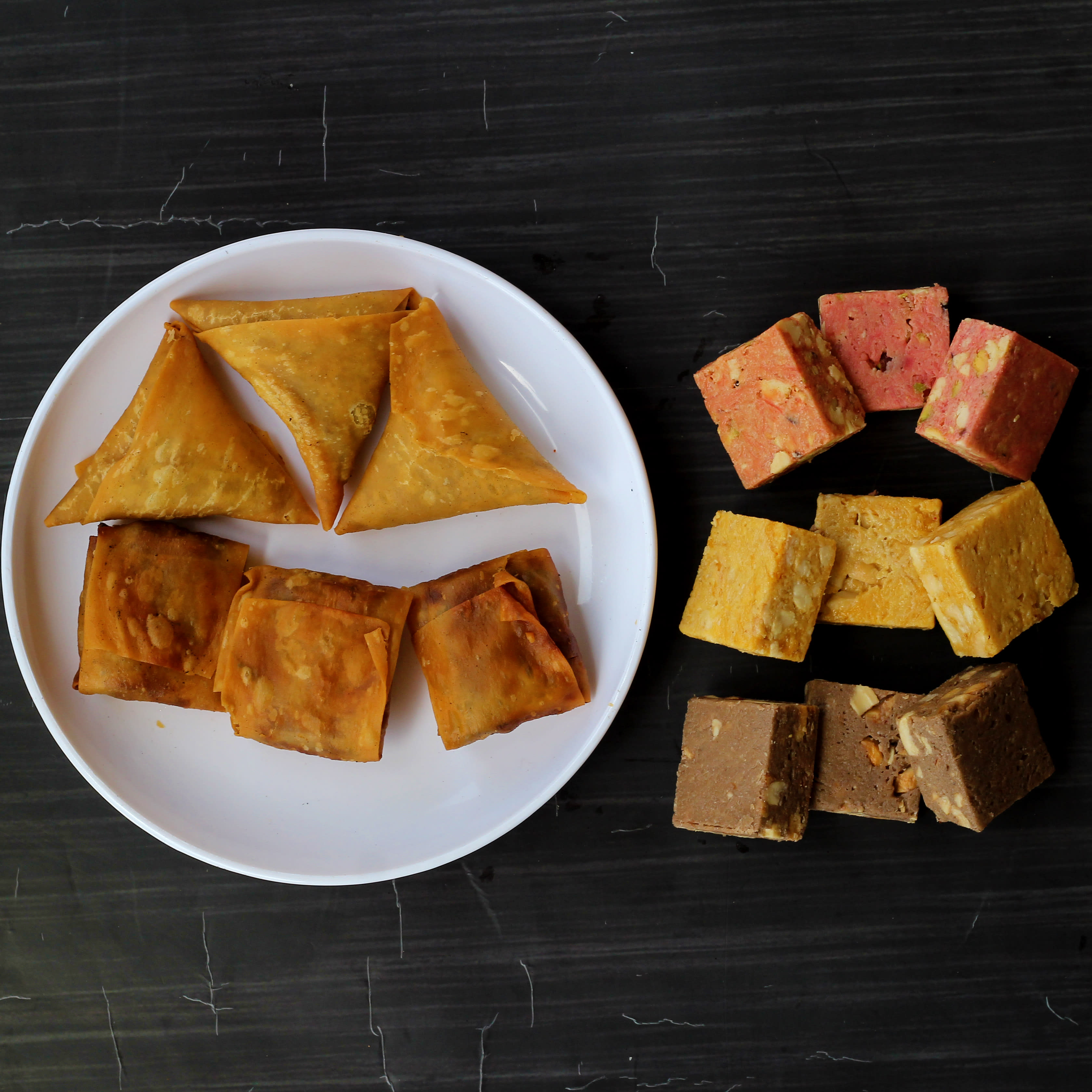 Praful Sweets And Namkeen - Logo