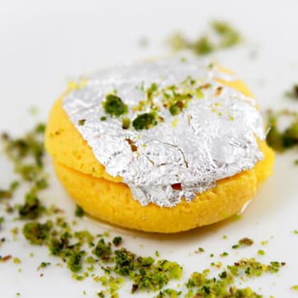 PREM SWEETS AND SAVOURIES - Logo