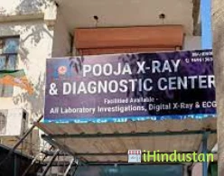 Puja X-ray Clinic - Logo