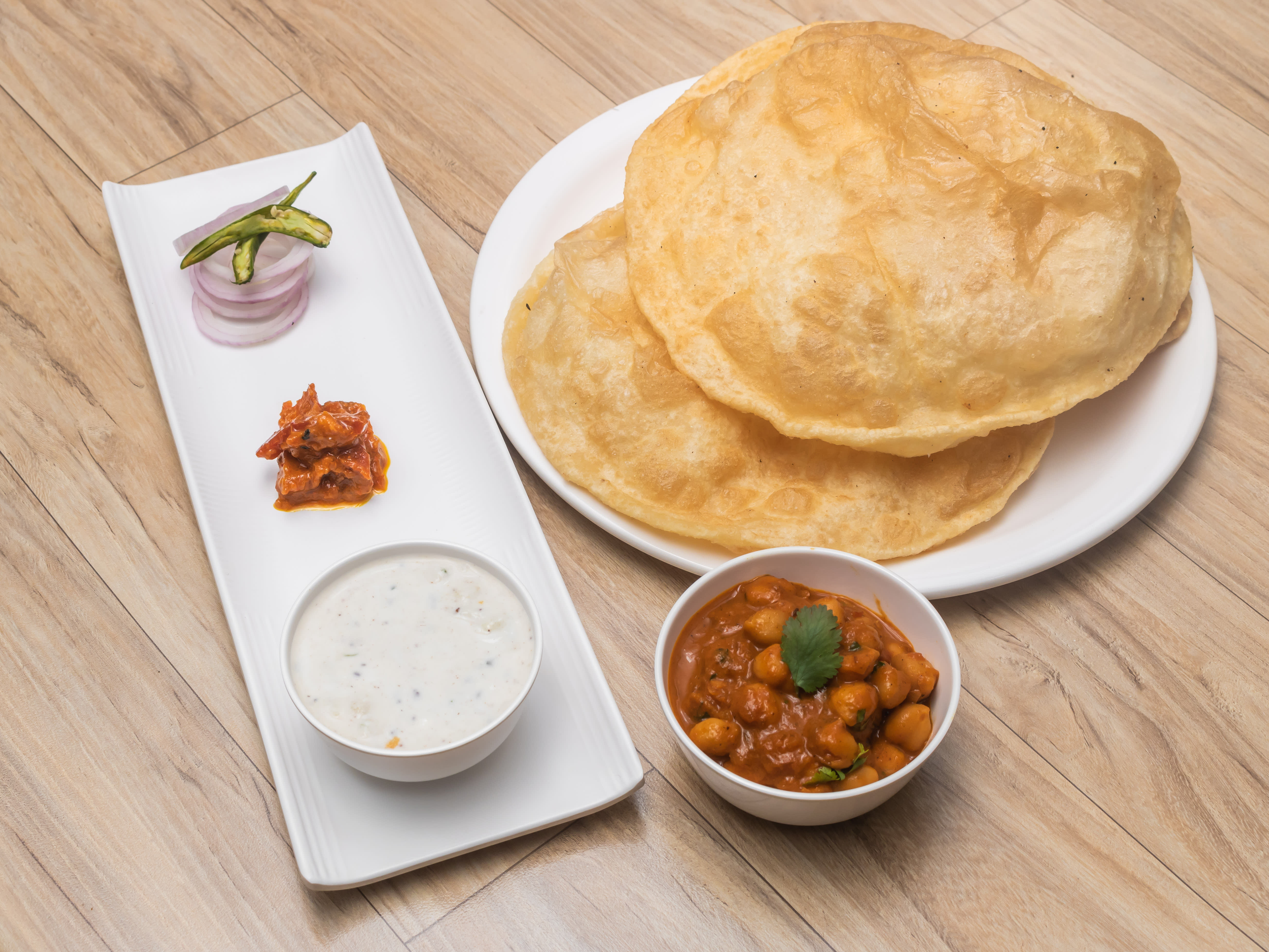 PUMMY TUMMY BHATURE PLAZA - Logo