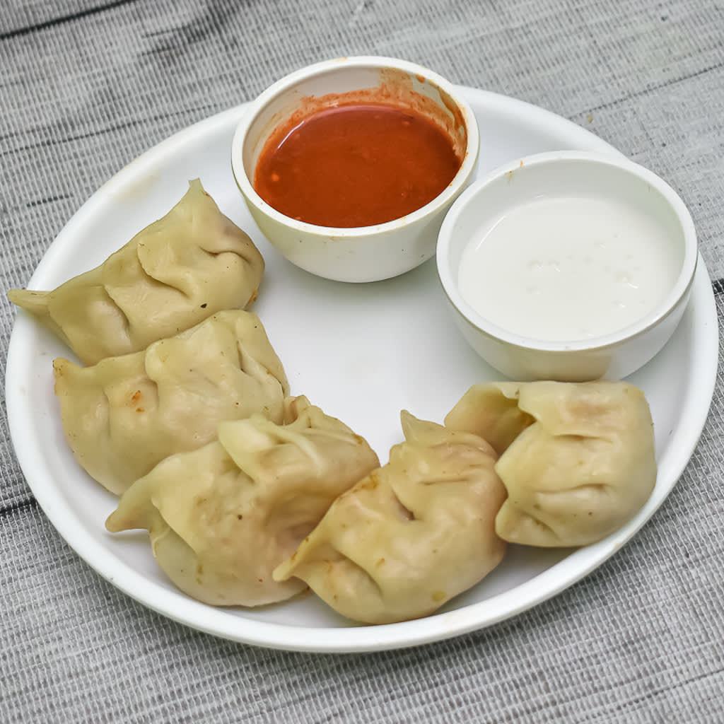 Purnima Momos World - Logo