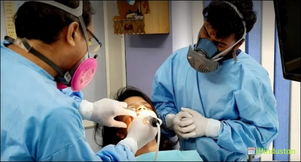 PUSHPA DENTAL SPECIALITY CENTRE - Logo
