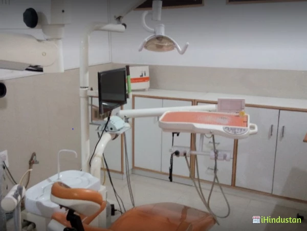 QASIM DENTAL CLINIC MYSURU'S FIRST MICRODENTISTRY CENTR - Logo