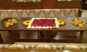 Radhika Veg Restaurant - Logo
