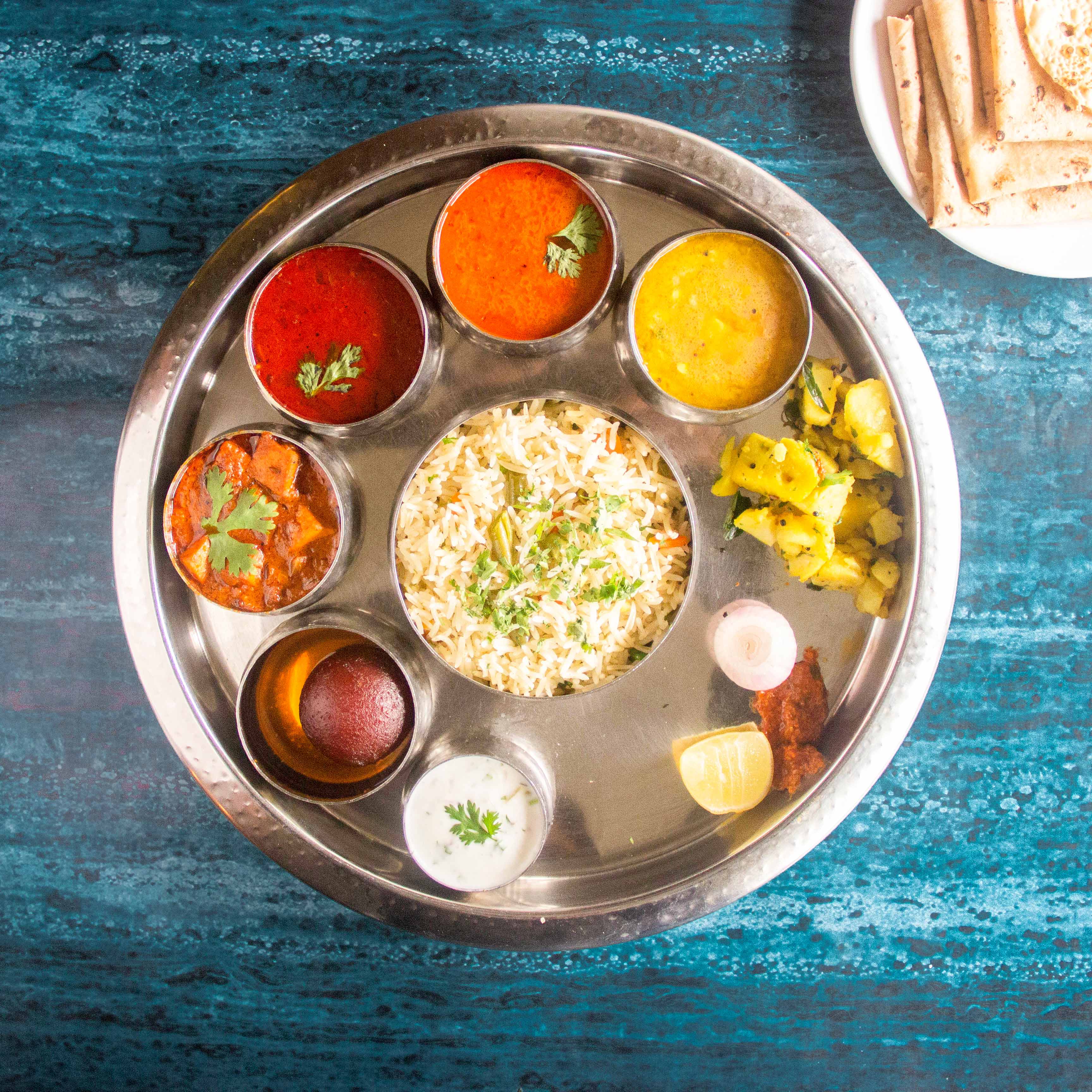 Radhika Veg Restaurant - Logo