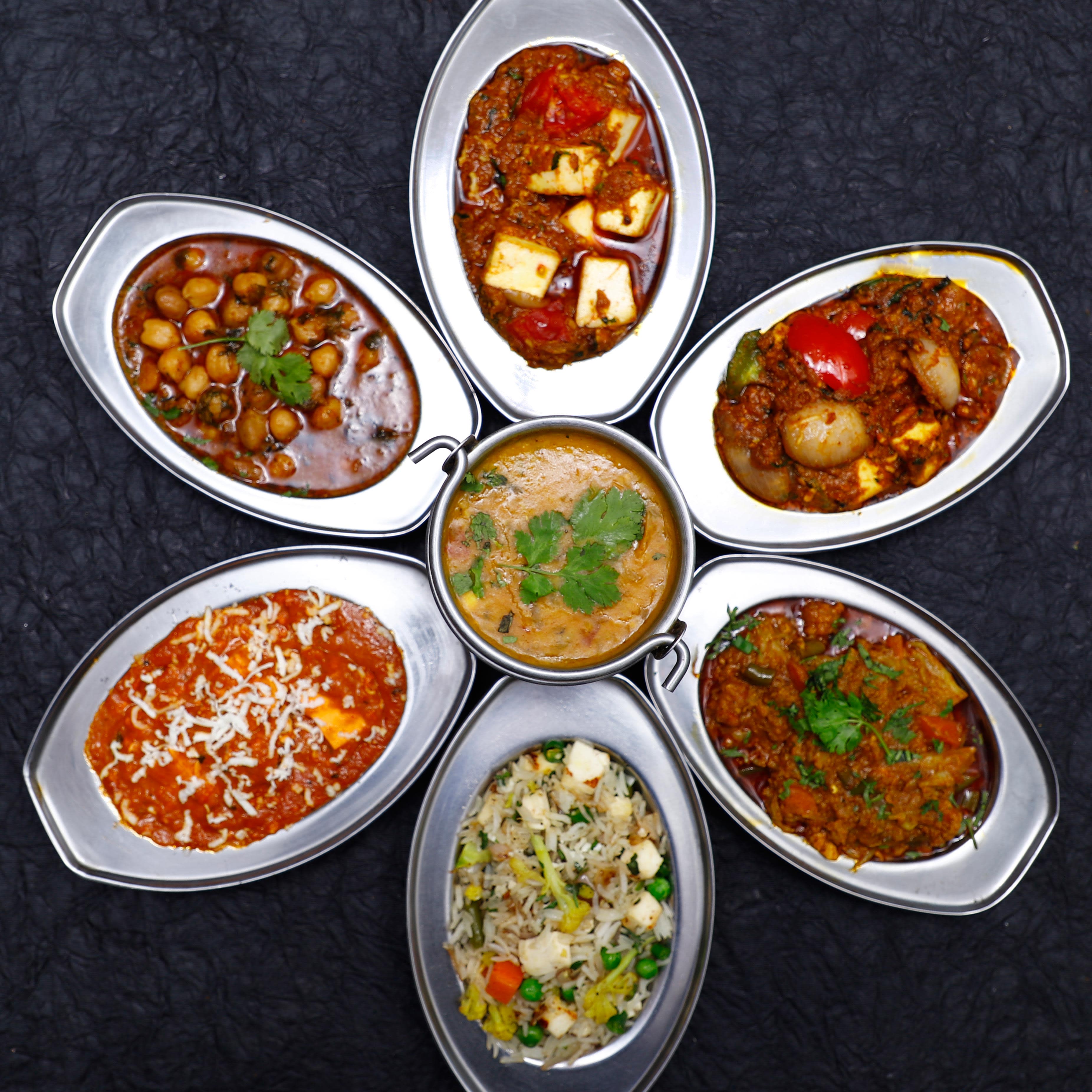 Raghuveer Restaurant - Logo
