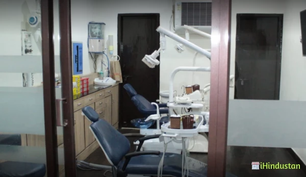 Raj Dental Care & Implant Centre - Logo