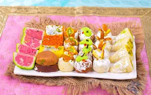 Rajdhani Satara Sweets - Logo