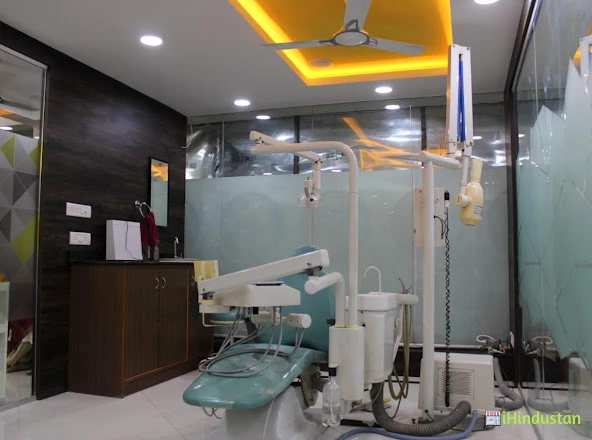 Rajesh cosmetic and implant dentistry - Logo