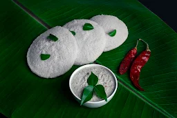 Raju Tiffens And Caterers - Logo