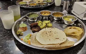 Ramdev Dhaba Pure Veg Family Restaurants - Logo