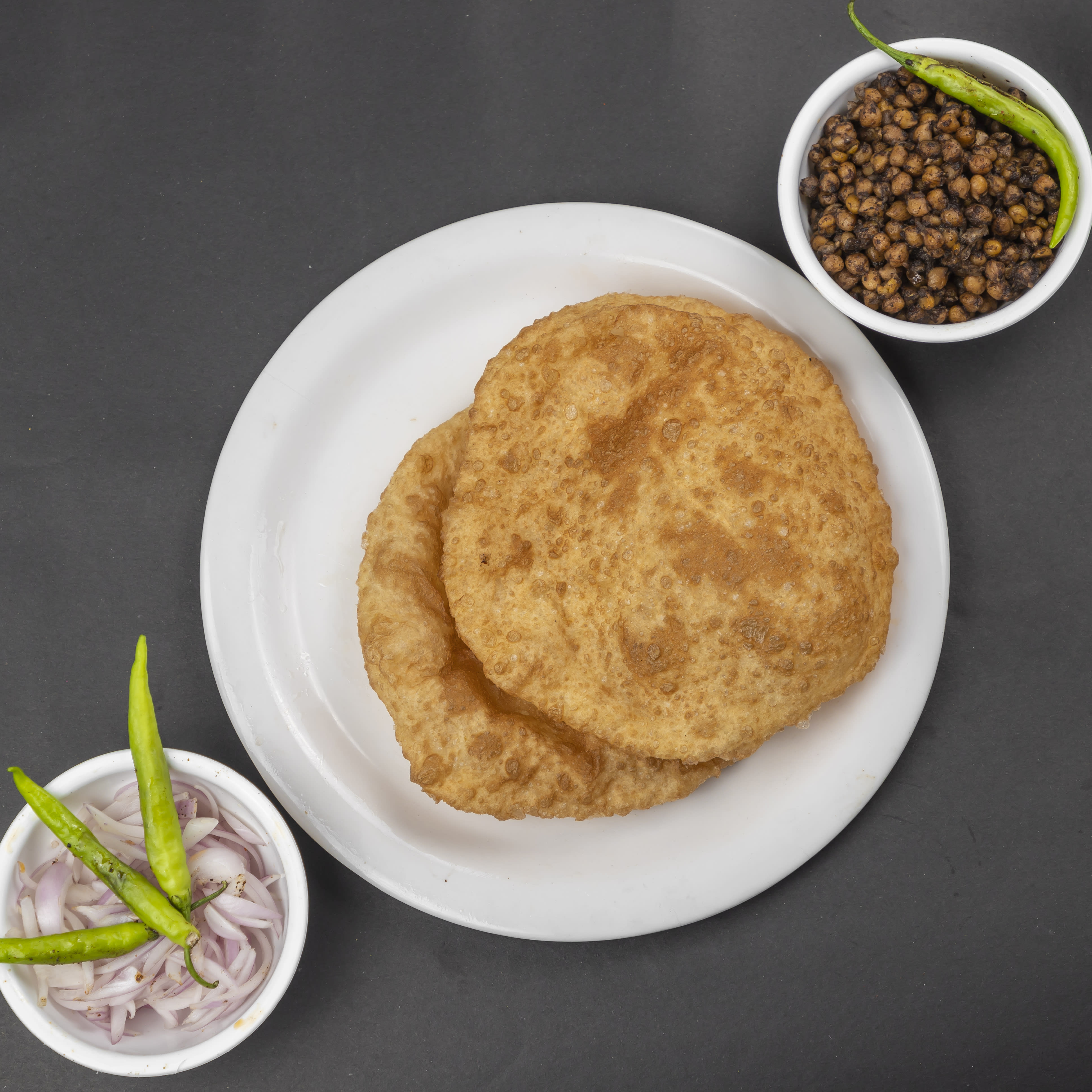 Ram Lal Chole Bhature (D.N.College) - Logo