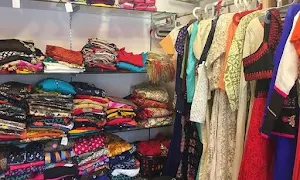 Rangoli - The Designer Boutique - Logo