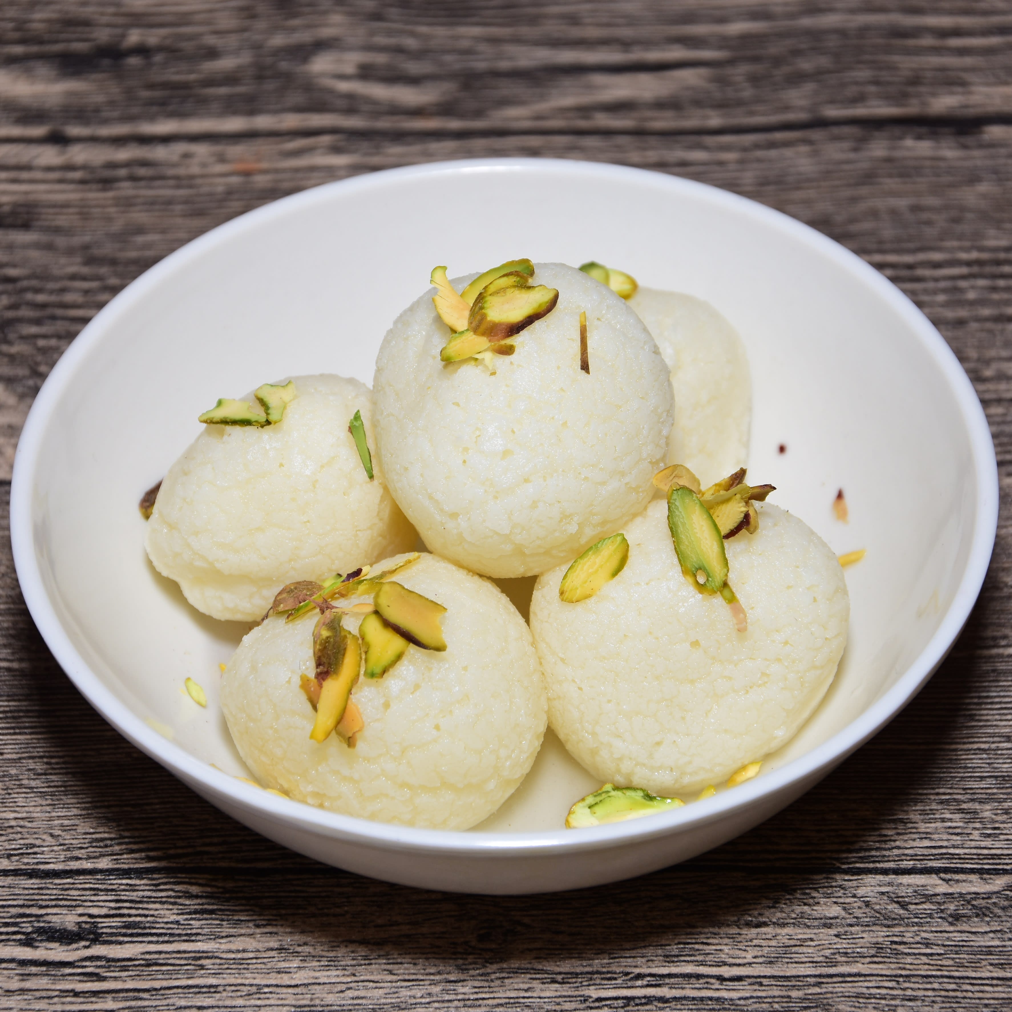 Rasmalai sweet & Namkeen - Logo