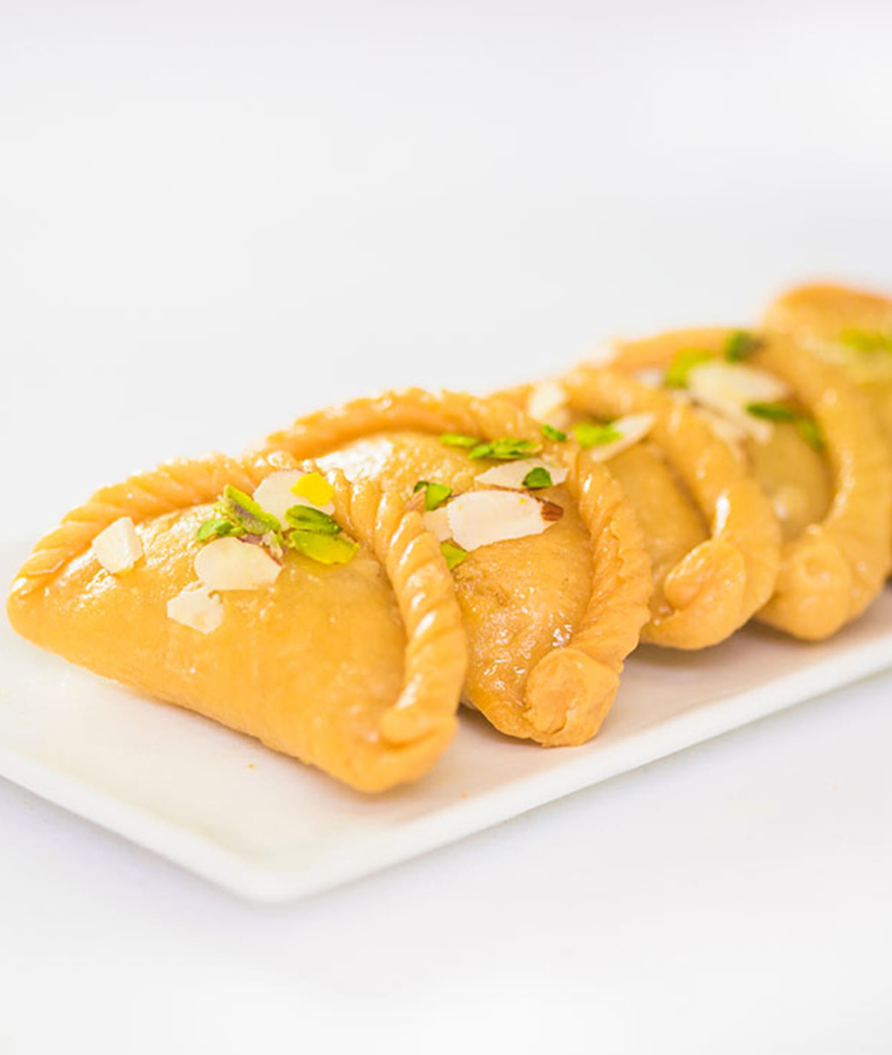 Rasraj Sweets & Cakes - Logo