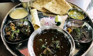 Raudra Bhairavi Restaurant - Logo