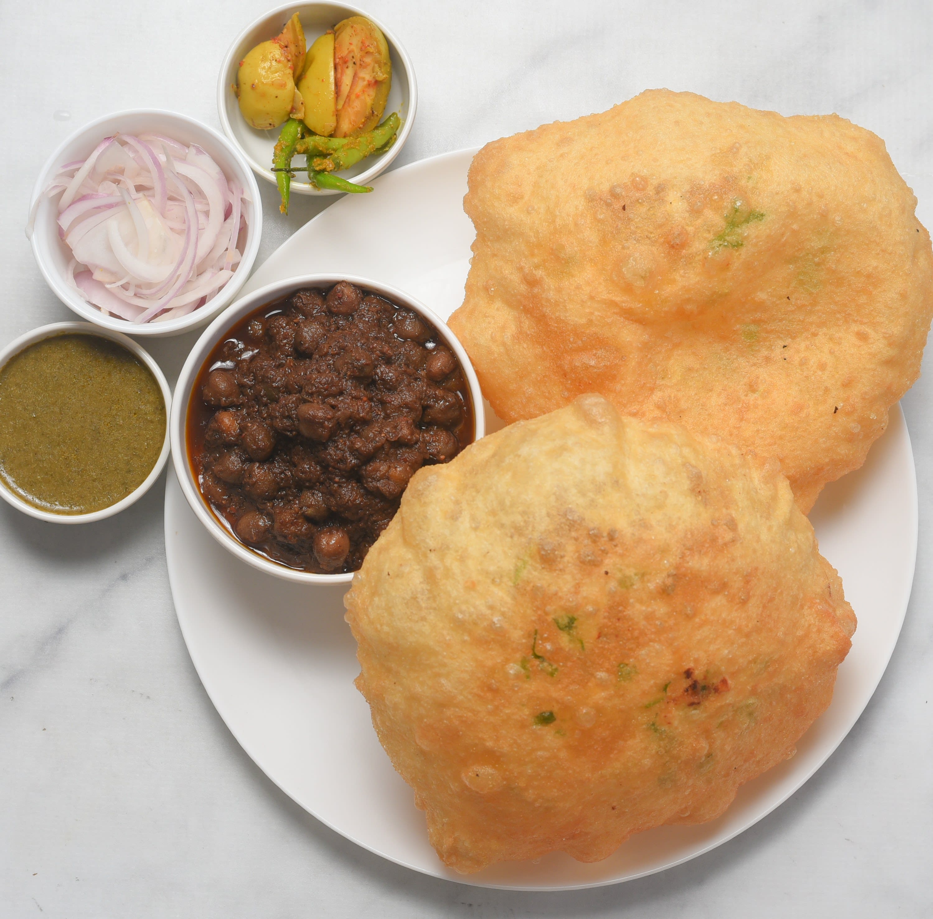 Rawalpindi De Mashoor Chole Bhature - Since 1965 - Logo