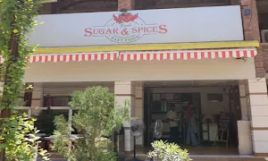 Real Sugar And Spices - Logo