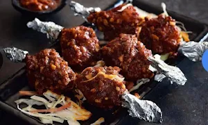 Red Chillies-Taste Of India - Logo