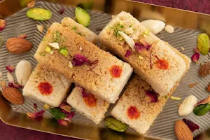 Rekha Sweets - Logo
