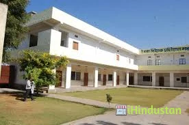 Rekha T T College - Logo