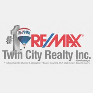Re/max Heritage Inc - Logo