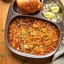 Renuka Mata Misal & Snacks Center - Logo