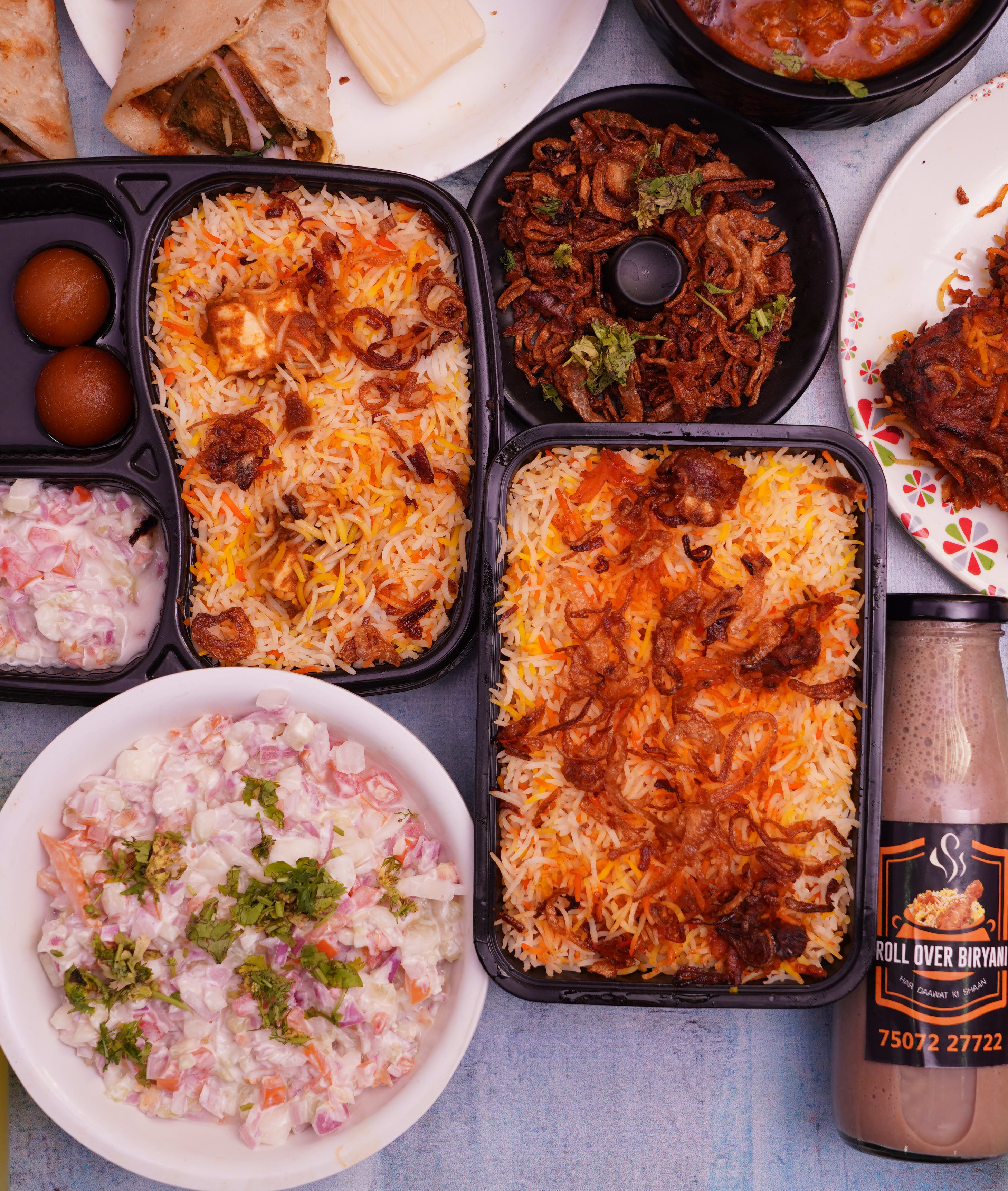 ROLL OVER BIRYANI - Logo