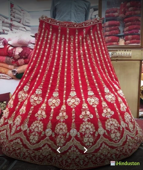 Roopam Saree Shop - Logo