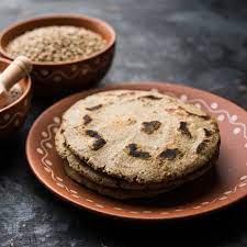 Roopas home made food products - Logo