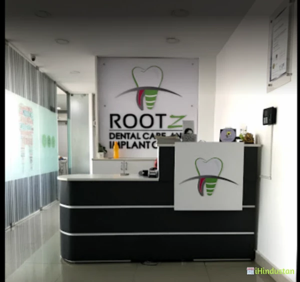 Rootz Dental Care and Implant Center - Logo