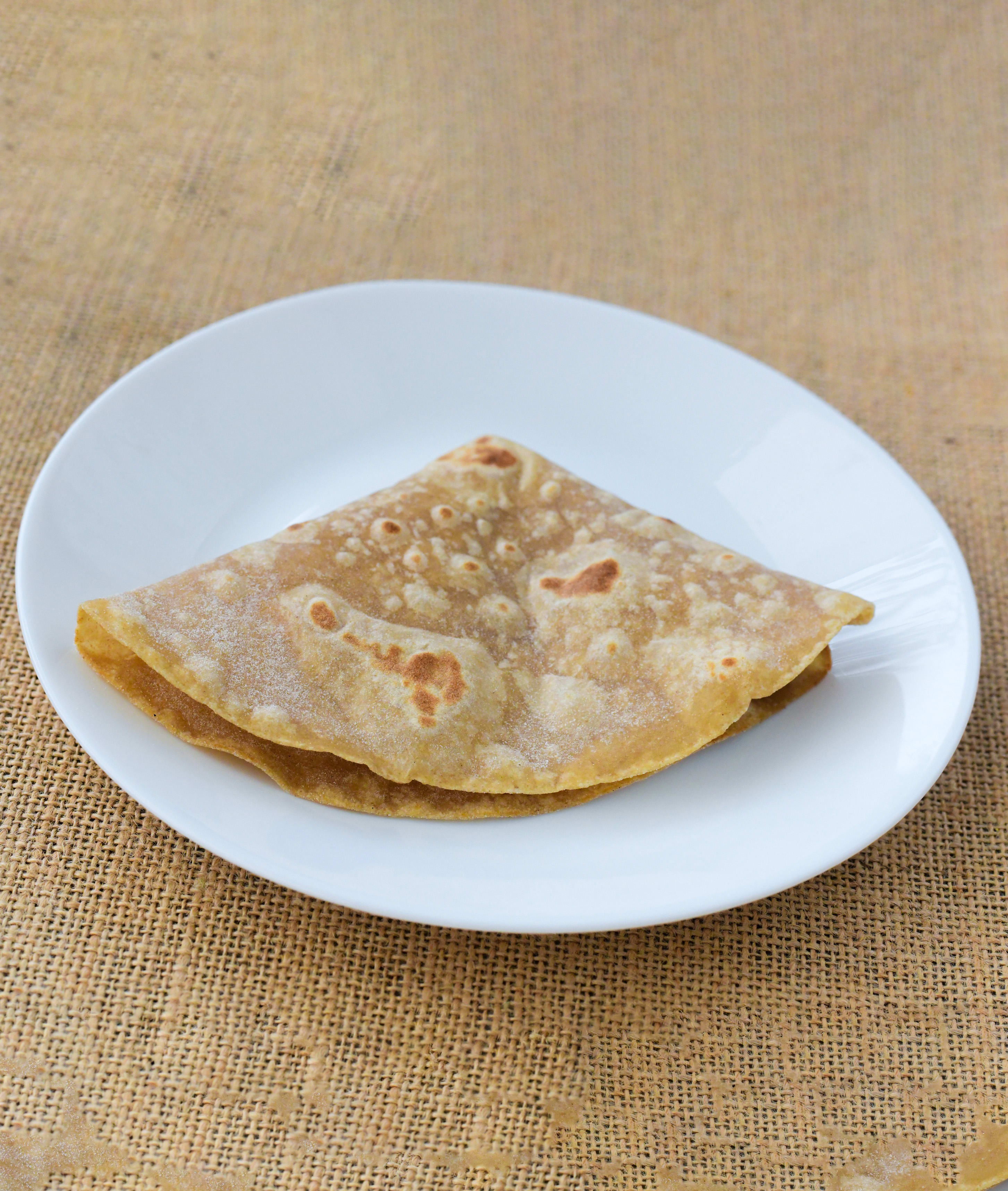 ROSHNI CHAPATI AND PARATA HOUSE - Logo