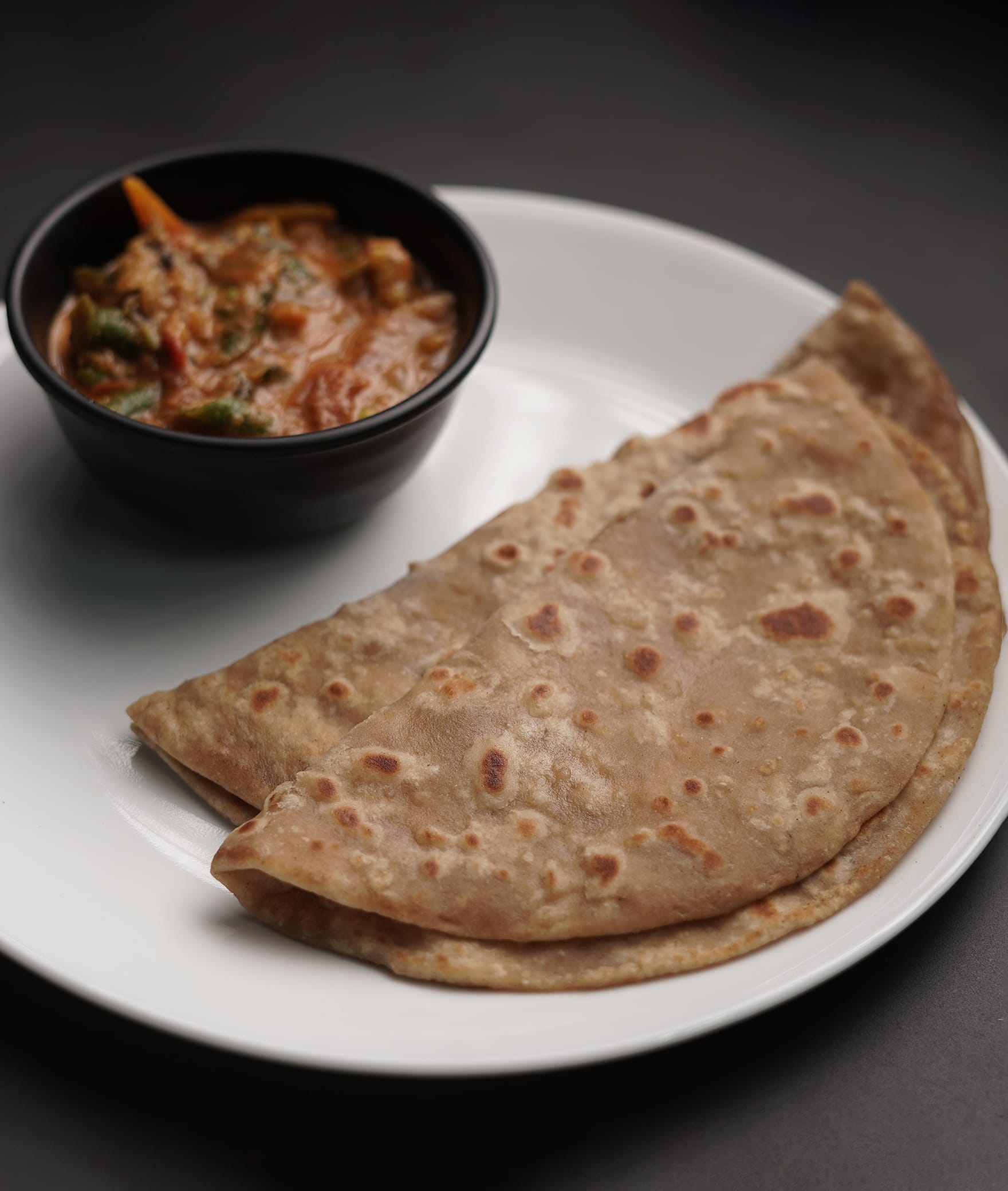 ROTI AND SIDES - Logo