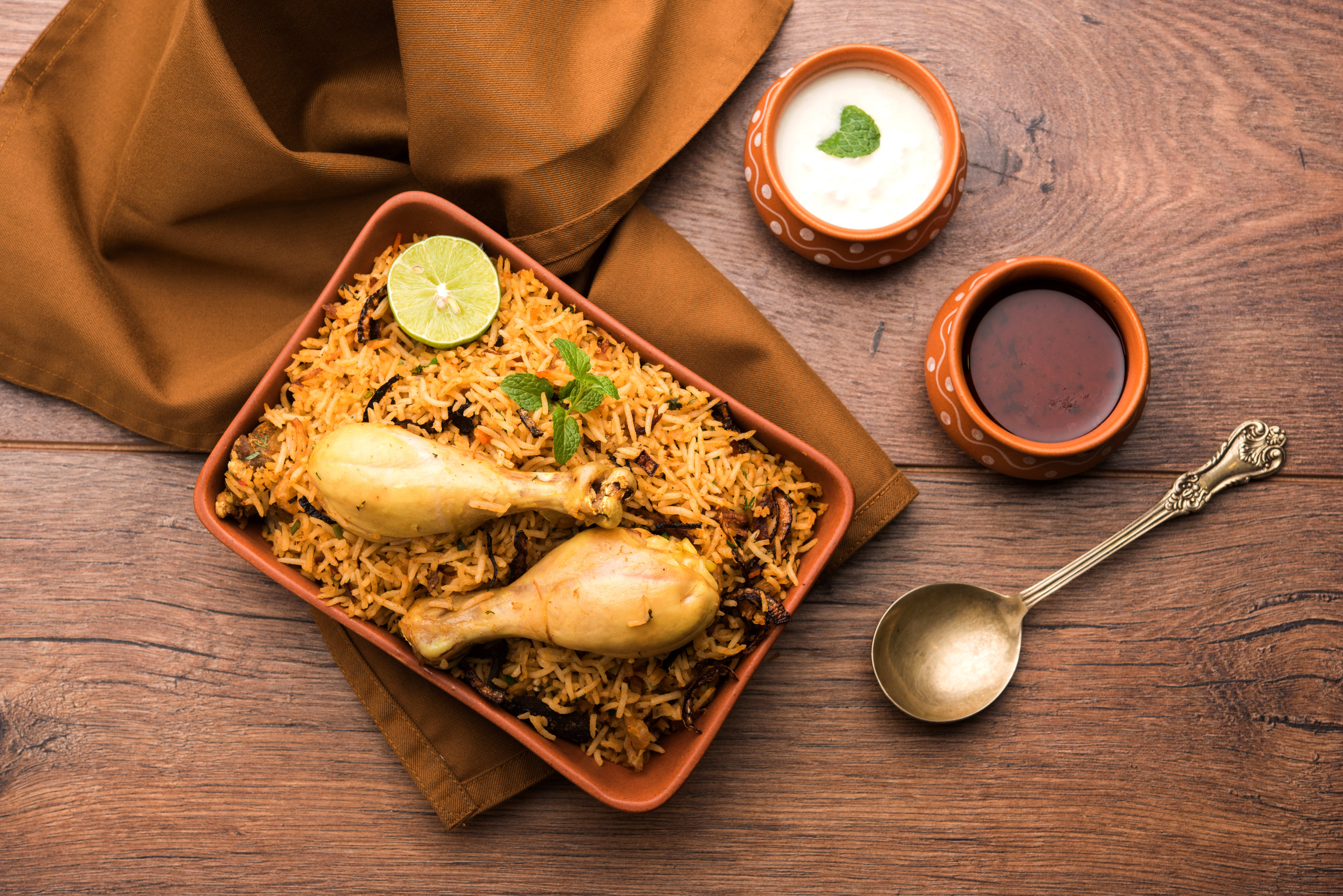 Royal Kolkata Dum Biryani - Logo