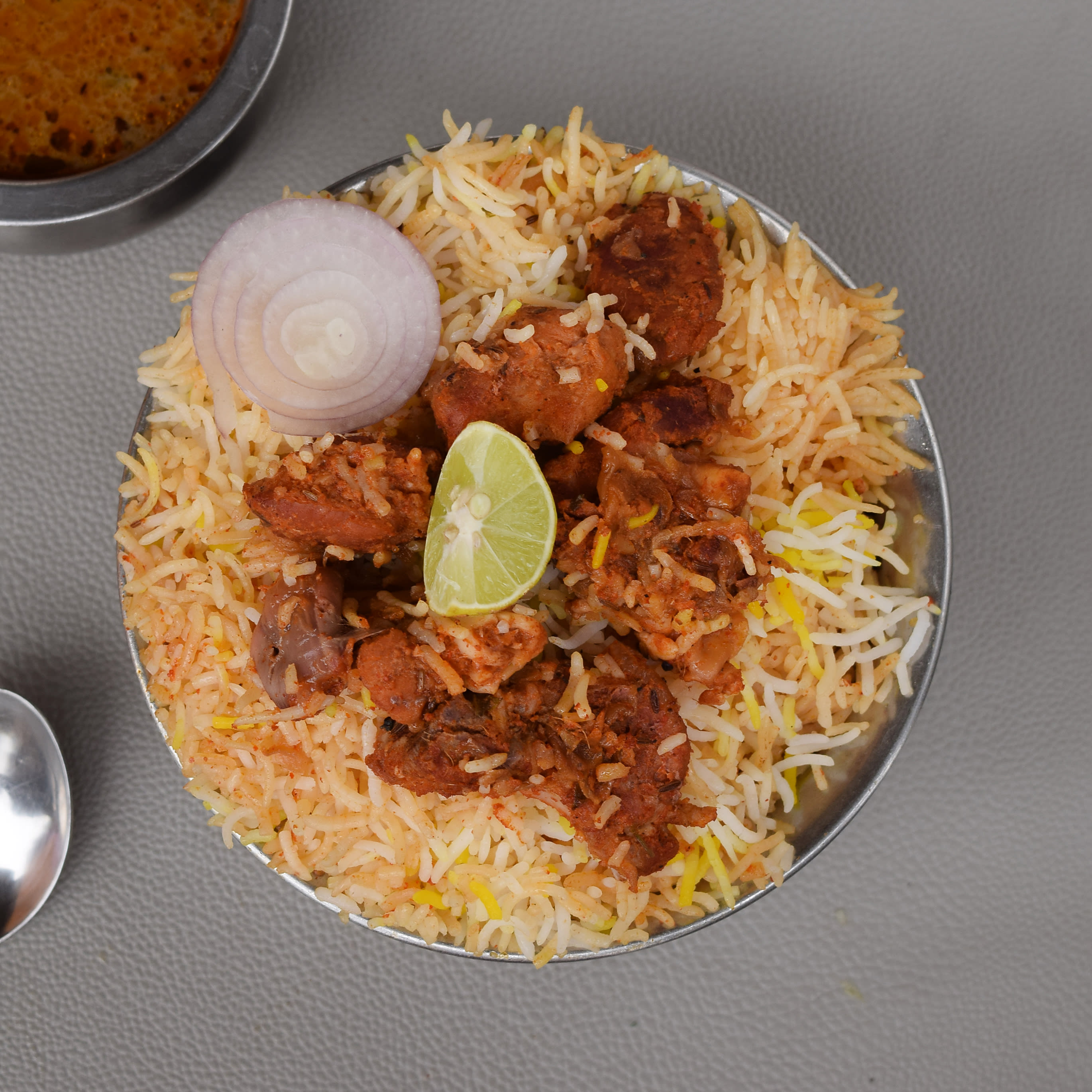 R Royal Bawarchi Restaurant - Logo