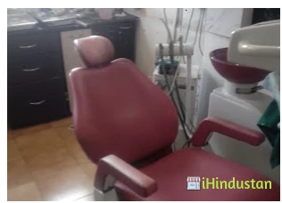 Rukmini Dental Clinic - Logo